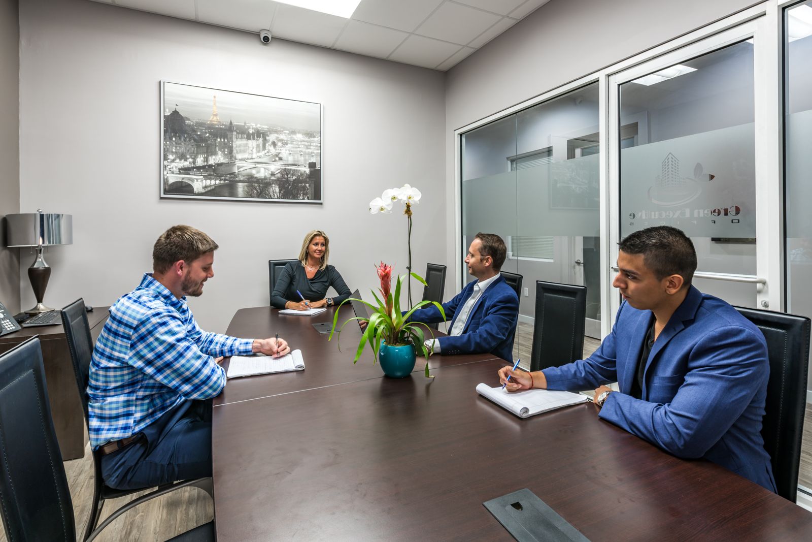 Team meeting in the 12-seat conference room