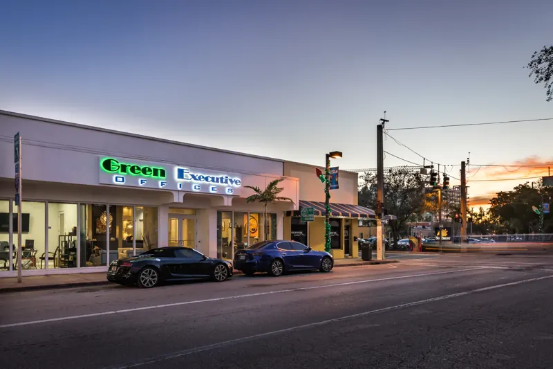 Green Executive Offices on Tyler Street at dusk